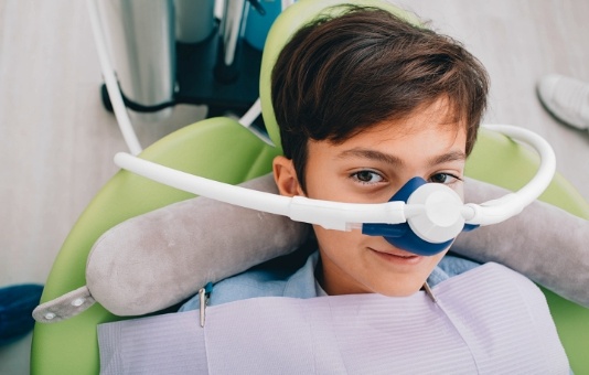 Young patient relaxed thanks to nitrous oxide sedation dentistry