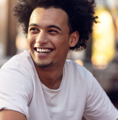 a person showing their missing tooth
