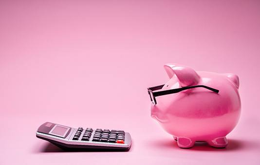 Piggy bank and calculator