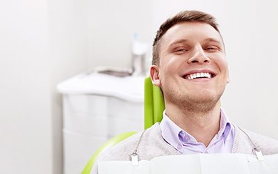 Man with veneers in Garland smiling