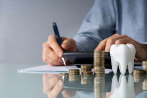 a patient examining a dental insurance form